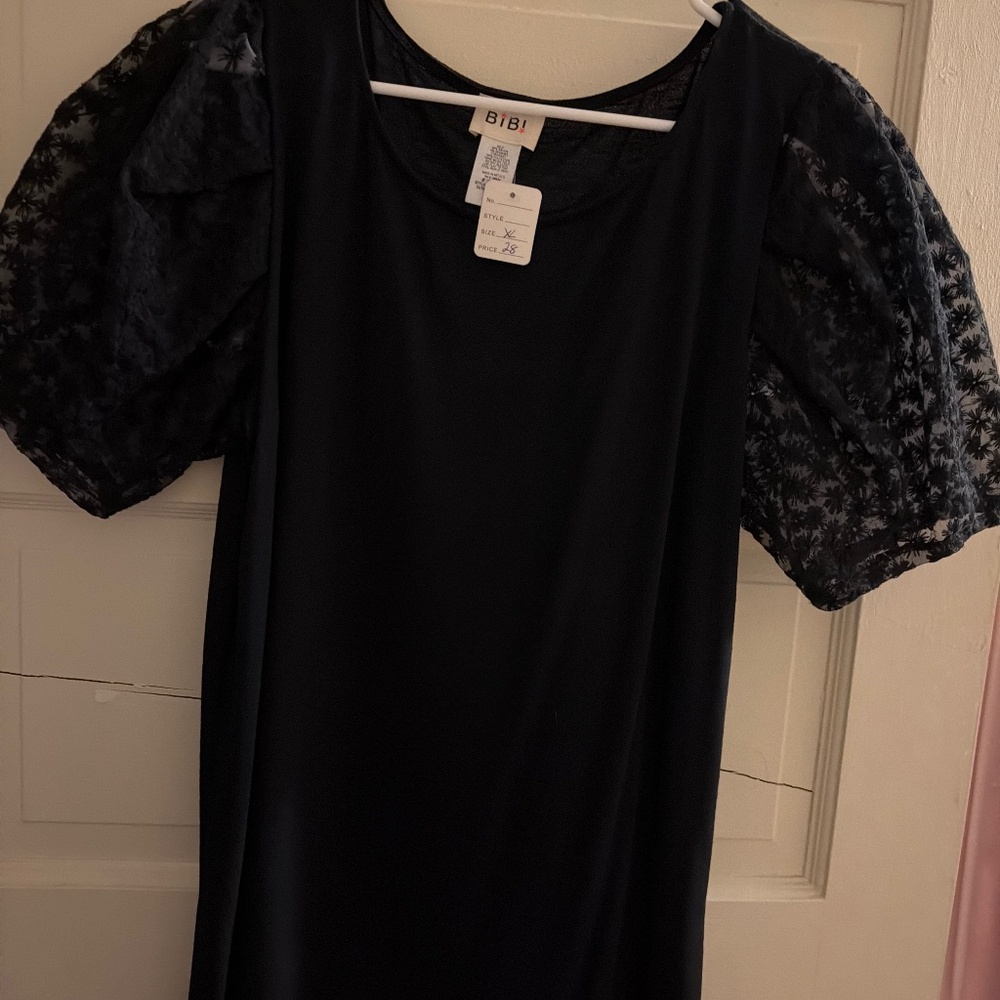 Black top, fun sleeves!